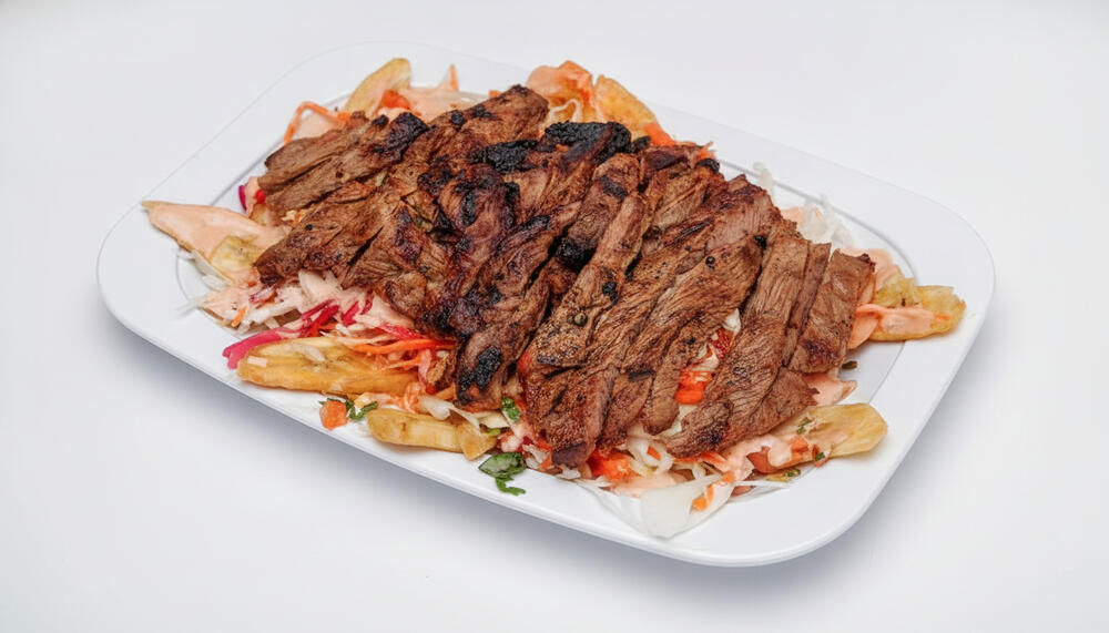 Carne Asada Con Tajadas